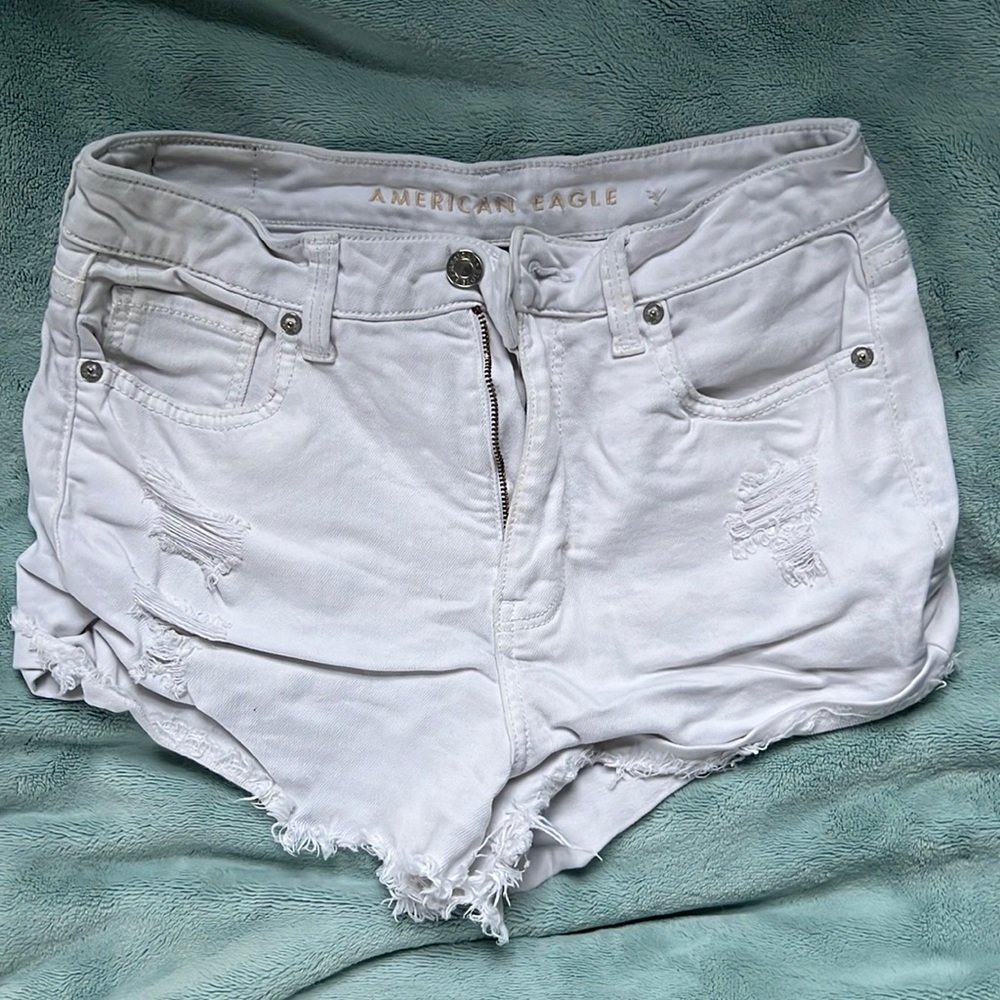 American Eagle white ripped denim shorts